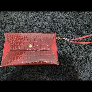 Red patent | red faux leather clutch with strap ~